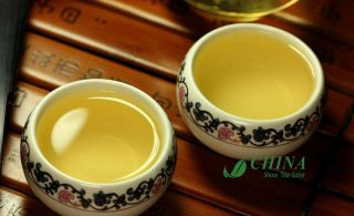Chinese Bingdao Ancient - tree Aged Puer Cake TEA famous puer tea in china 5
