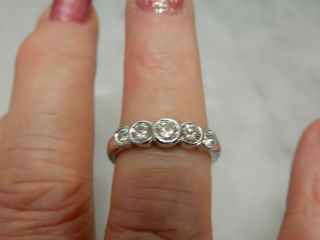 A Fabulous 9 Ct White Gold 1.  25 Carat Five Stone Diamond Ring