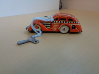 Vintage Marx Tin Wind Up Tricky Taxi Toy Car