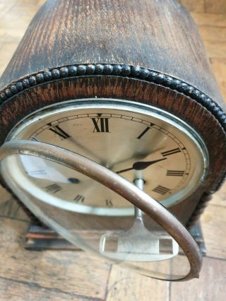 vintage wooden mantle clock with key ticks,  chimes but movement needs a 2