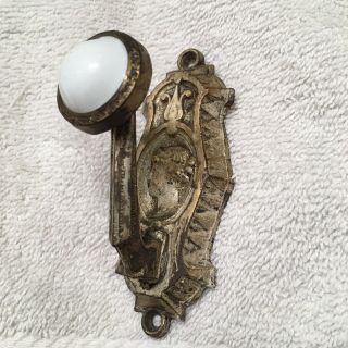ANTIQUE PAIR FRENCH BRASS COAT HOOKS WITH FACE AND CERAMIC ENDS 2
