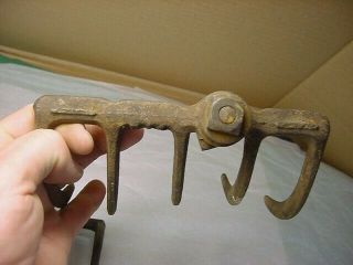 2 antique cast iron garden cultivator parts marked R - 14 - - 5 TINES EACH 3