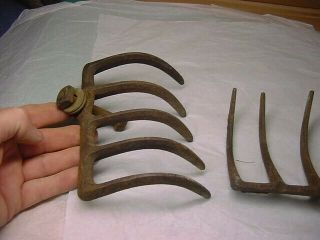 2 antique cast iron garden cultivator parts marked R - 14 - - 5 TINES EACH 5