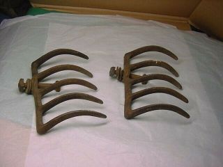 2 antique cast iron garden cultivator parts marked R - 14 - - 5 TINES EACH 6