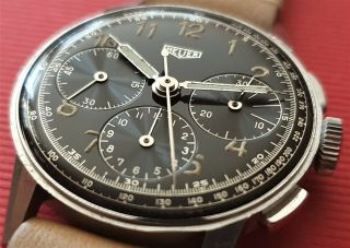 Vintage black gilt Heuer chronograph Cal.  Valjoux 72 from 40 ' s 12