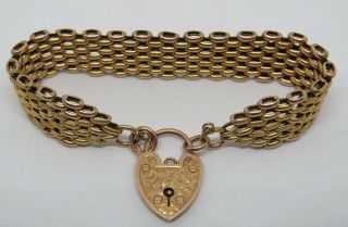 Quality 9ct Gold Oval Link Gate Bracelet On A 9ct Heart Shaped Padlock 18.  34g
