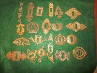 21 Different Brass Keyhole Covers Escutcheons.  Antique Hardware