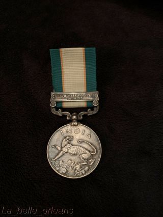 GEORGE V NORTH WEST FRONTIER MEDAL 1936 - 37 CLASP.  AWARDED TO A FAZAL I.  S.  O 2
