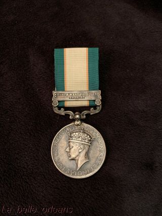 GEORGE V NORTH WEST FRONTIER MEDAL 1936 - 37 CLASP.  AWARDED TO A FAZAL I.  S.  O 3