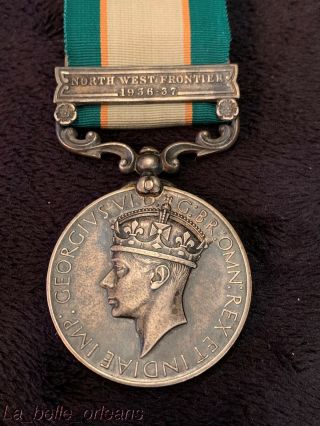 GEORGE V NORTH WEST FRONTIER MEDAL 1936 - 37 CLASP.  AWARDED TO A FAZAL I.  S.  O 4