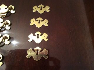 8 vintage polished brass 2 1/2 inch drawer pulls and 4 key plates 3