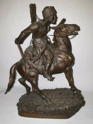 Antique Bronze Sculpture - A Cossack Charging On Horseback (signed)