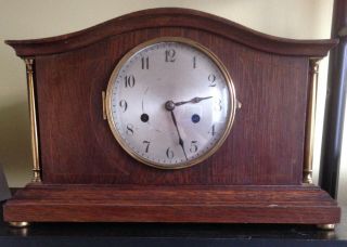 Vintage Chiming Mantel Clock With Brass Collannades To The Front.