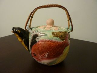 Antique Bisque Japanese Teapot With Embossed Fish Lobster Crab & Octopus Cover
