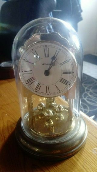 Vintage German Torsion Quartz Clock Under Glass Dome