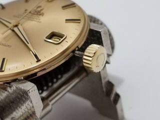 Omega Constellation vintage 18K gold watch.  Caliber: 561 (In 12