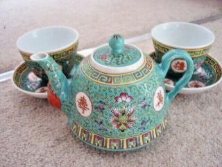 Chinese Famille Rose green porcelain tea set:2 cups,  2 saucers,  teapot,  spoon 3