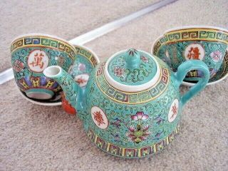 Chinese Famille Rose green porcelain tea set:2 cups,  2 saucers,  teapot,  spoon 4