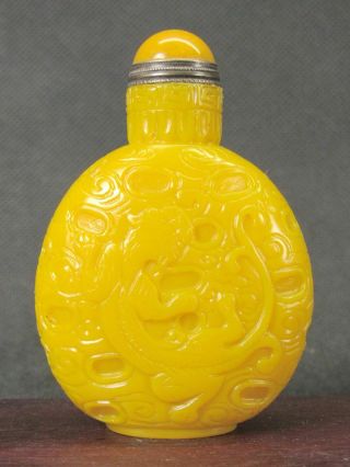 Chinese Two Dragon Carved Yellow Peking Glass Snuff Bottle