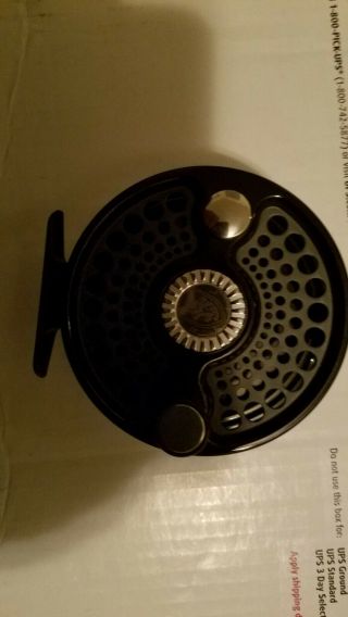 Charlton fly reel.  8 left hand wind with green case LOOK AT PICS. 9
