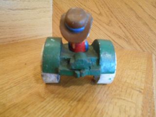 Cast Iron Porky Pig driving green Tractor cute old heavy 3