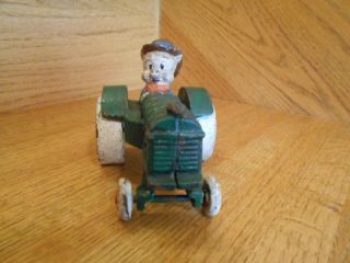 Cast Iron Porky Pig driving green Tractor cute old heavy 4