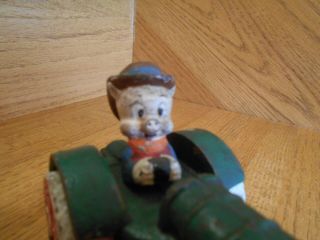 Cast Iron Porky Pig driving green Tractor cute old heavy 5