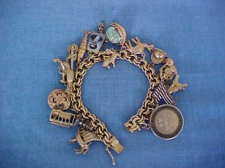 VINTAGE 14K YELLOW GOLD CHARM BRACELET LOADED 24 GOLD CHARMS 79 GRAMS TRAVEL 11