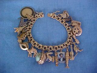 VINTAGE 14K YELLOW GOLD CHARM BRACELET LOADED 24 GOLD CHARMS 79 GRAMS TRAVEL 12
