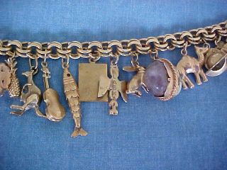 VINTAGE 14K YELLOW GOLD CHARM BRACELET LOADED 24 GOLD CHARMS 79 GRAMS TRAVEL 9