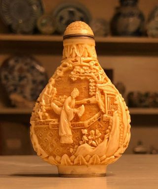 Superbly Carved Chinese White Cinnabar Snuff Bottle