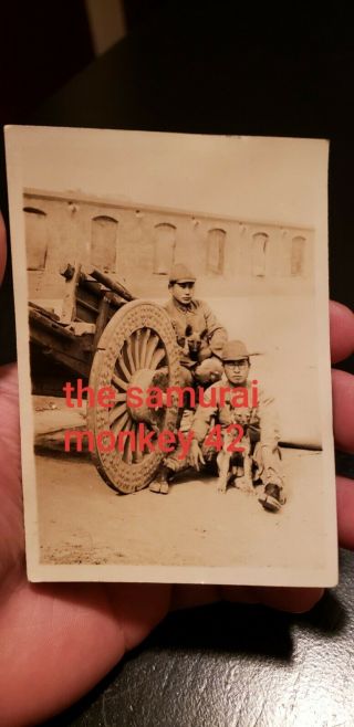 WW2 Japanese photo of Japanese SOLDIERs right next to CANNON and dogs 2