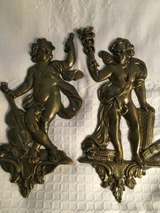 Vintage Metal Figural Wall Decor.  Pair In Classical Style.  11.  5  X5  Brass Tone