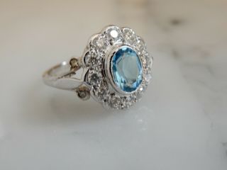A Stunning 9 Ct White Gold Oval 3.  00 Carat Blue Topaz And 0.  75 Ct Diamond Ring