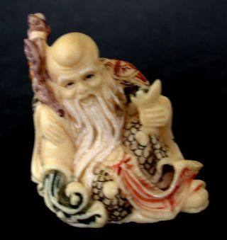 Japanese Ivory Color Bone Netsuke - Longevity Man Sits With Ruyi & Cane