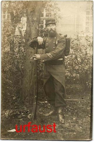 French Wwi Soldier With Rifle And Cigarette Photo