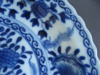 A small Chinese Kangxi style blue and white dish,  symbol mark. 3