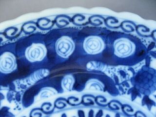 A small Chinese Kangxi style blue and white dish,  symbol mark. 4