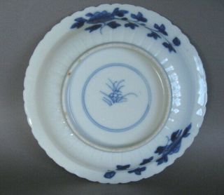 A small Chinese Kangxi style blue and white dish,  symbol mark. 6