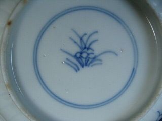 A small Chinese Kangxi style blue and white dish,  symbol mark. 7