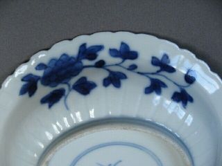 A small Chinese Kangxi style blue and white dish,  symbol mark. 8