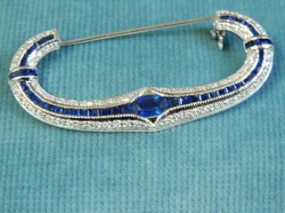 A Fabulous 18 Ct White Gold Sapphire And Diamond Brooch