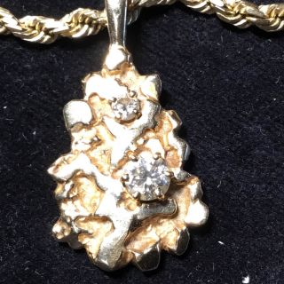 Vintage marked 14k yellow gold diamond pendant on 20” 14k necklace 35.  5 grams 2