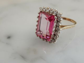A FABULOUS 9 CT GOLD STEP CUT 10.  00 CARAT PINK GEMSTONE AND DIAMOND RING 6