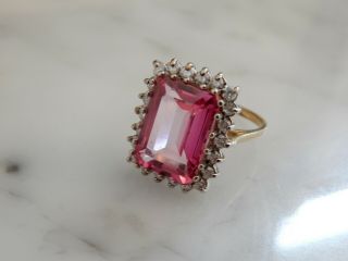 A FABULOUS 9 CT GOLD STEP CUT 10.  00 CARAT PINK GEMSTONE AND DIAMOND RING 7