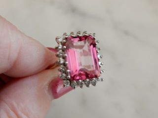 A FABULOUS 9 CT GOLD STEP CUT 10.  00 CARAT PINK GEMSTONE AND DIAMOND RING 8