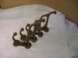 4 Large Antique Victorian Cast Iron Double Coat Hooks 5,  3/4  Long (reserved)
