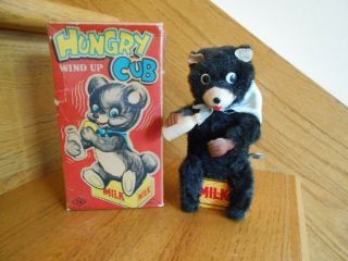 Hungry Cub Wind - Up Toy Plush Pours & Drinks Milk Box