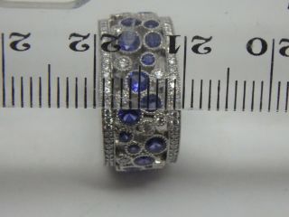 Tiffany & Co.  Platinum,  diamond and blue Sapphire Cobblestone band ring size 5.  5 10
