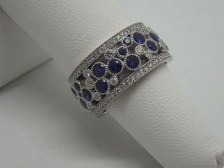 Tiffany & Co.  Platinum,  diamond and blue Sapphire Cobblestone band ring size 5.  5 4